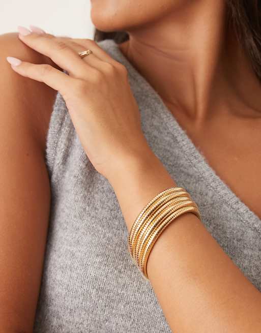 ASOS DESIGN wrap-around stretchy bracelet in gold tone