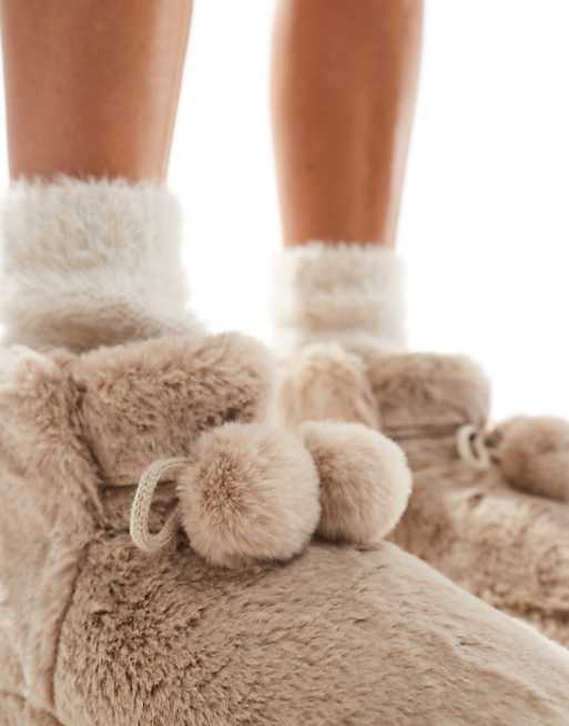 ASOS DESIGN Zyla Pom Pom Bootie Slippers In Mink