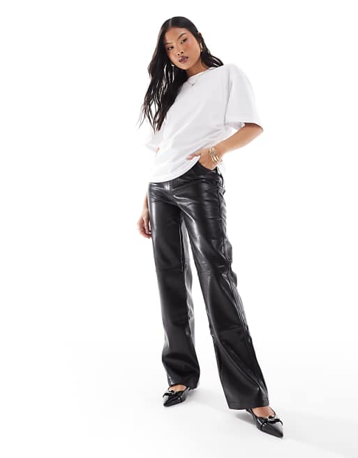 Bershka Petite straight leg faux leather trousers in black