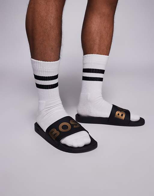 Boss Aryeh contrast logo slider in black and gold