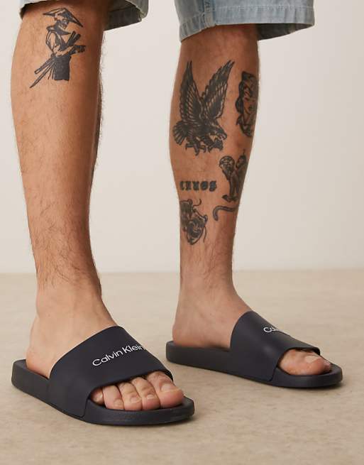 Calvin Klein logo sliders in navy