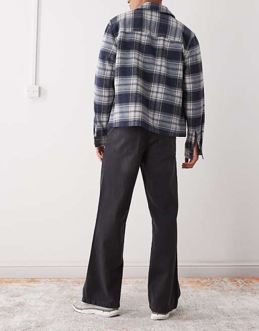 COLLUSION Flare Jean In Washed Black