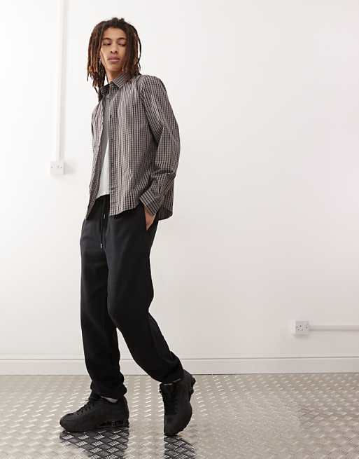 COLLUSION joggers in black