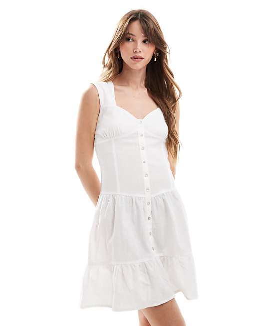 Esmee Exclusive Mini Beach Dress With Ruffle Skirt In Off White