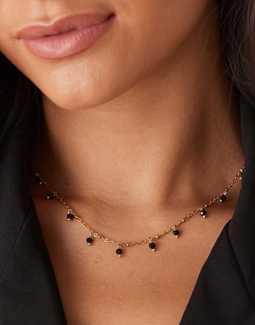 Lost Souls black stone charm necklace in 18ct gold plated stainless steel