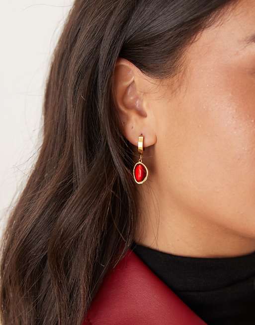 Lost Souls hoop earrings with dark red stone in 18ct gold plated stainless steel