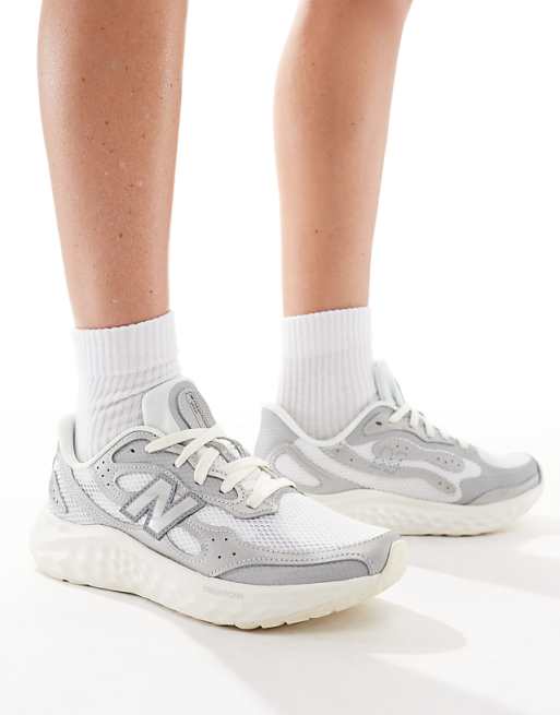 New Balance Arishi running trainers in silver