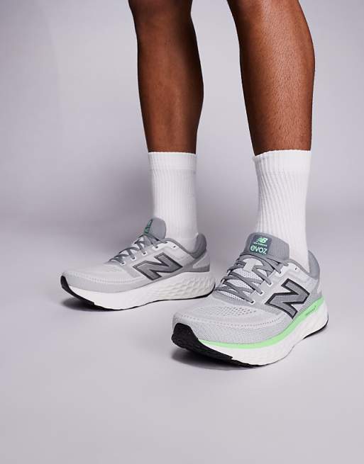 New Balance Evoz running trainers in grey and green