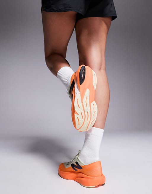 New Balance Fuel Cell Rebel V4 Womens Running Trainers In Orange