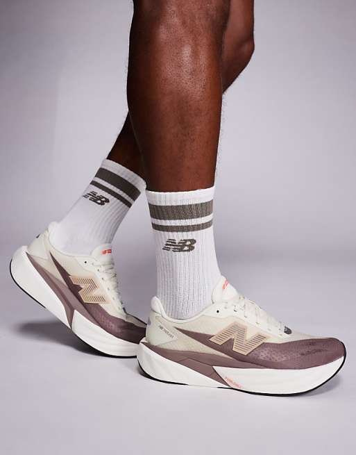 New Balance Fuelcell Rebel v5 mens running trainers in brown and beige