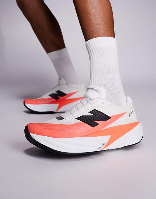 New Balance Fuelcell Rebel v5 mens running trainers in bright red and white