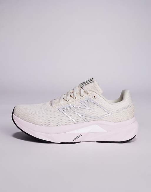 New Balance Propel Running Trainers In Beige And Pink