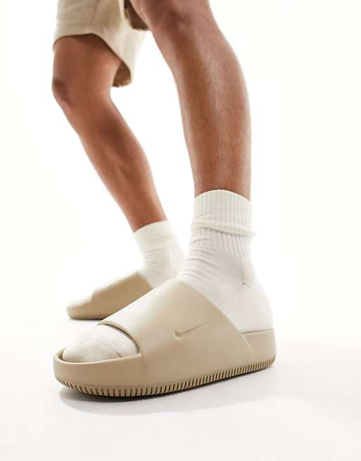 Nike Calm sliders in beige