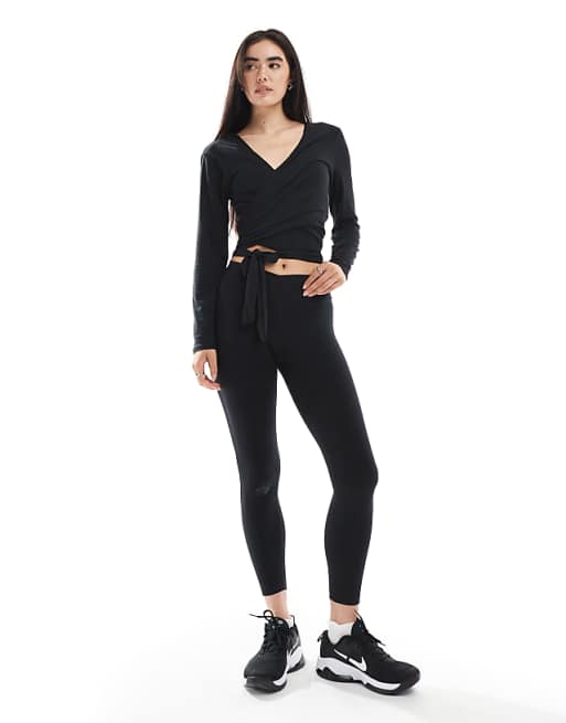 Nike One Training highwaisted 3 inch frilly shorts wrap longsleeve top and layered vest in black in black