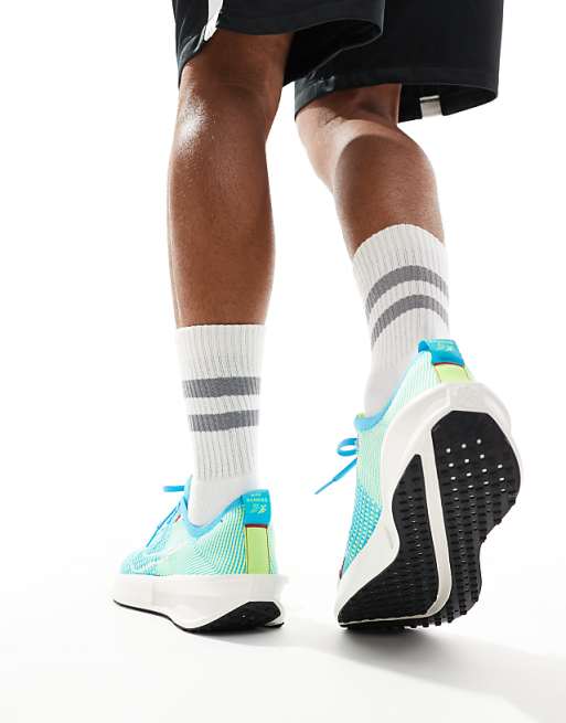 Nike Running Interact Run Trainers In Blue