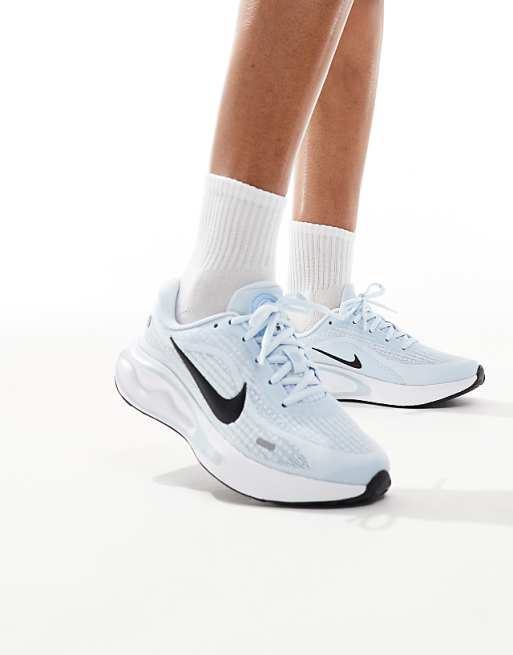 Nike Running Journey Run trainers in blue and white