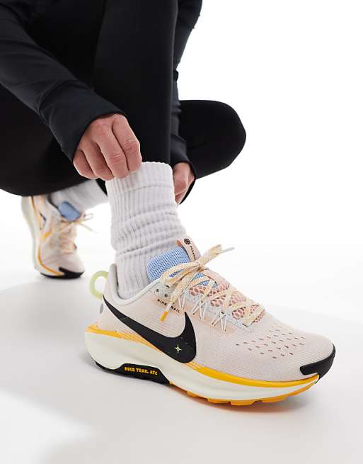 Nike Running ReactX Pegasus Trail 5 trainers in white and yellow