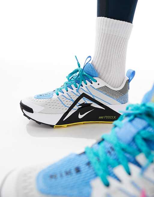 Nike Running ReactX Wildhorse Trainers In White And Blue