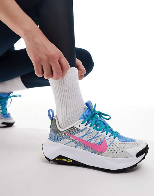 Nike Running ReactX Wildhorse trainers in white and blue