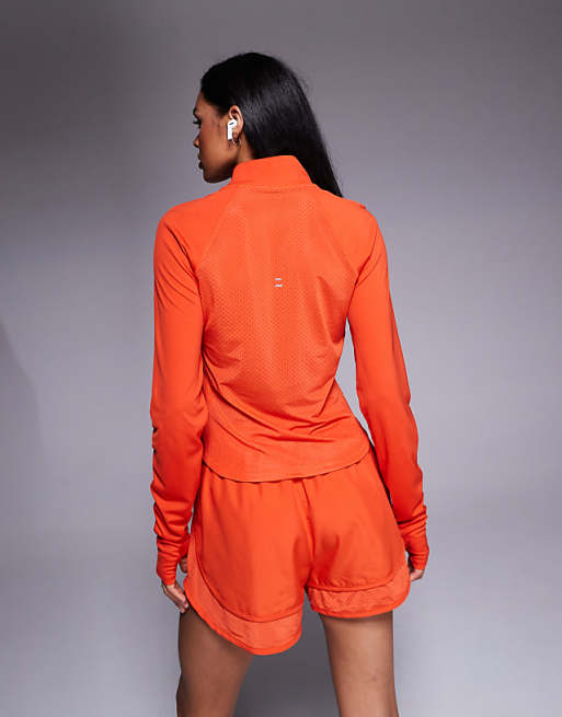 Nike Running Tempo Dri-FIT Half Zip Long Sleeve T-shirt In Red