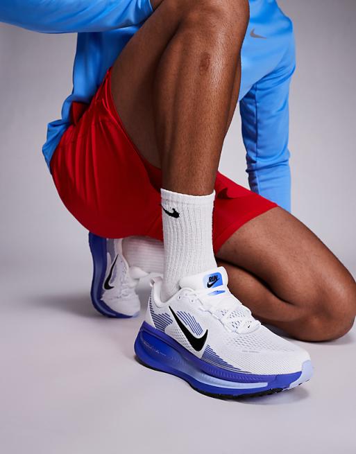 Nike Running Vomero 18 trainers in white and blue
