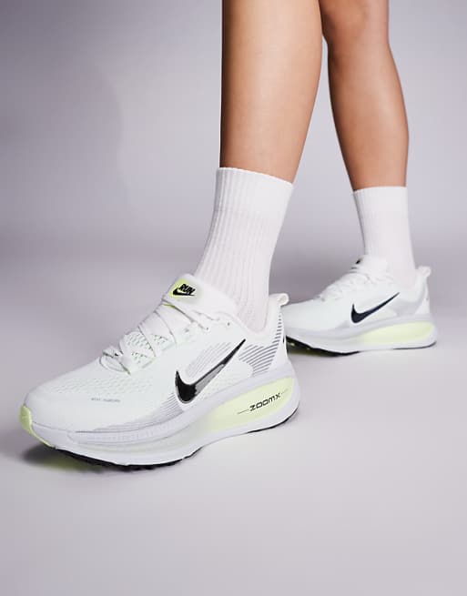 Nike Running Vomero 18 trainers in white and green