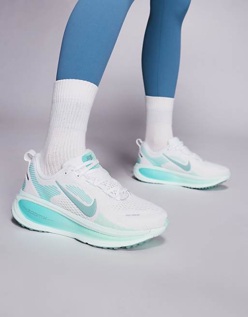 Nike Running Vomero 18 trainers in white and light blue