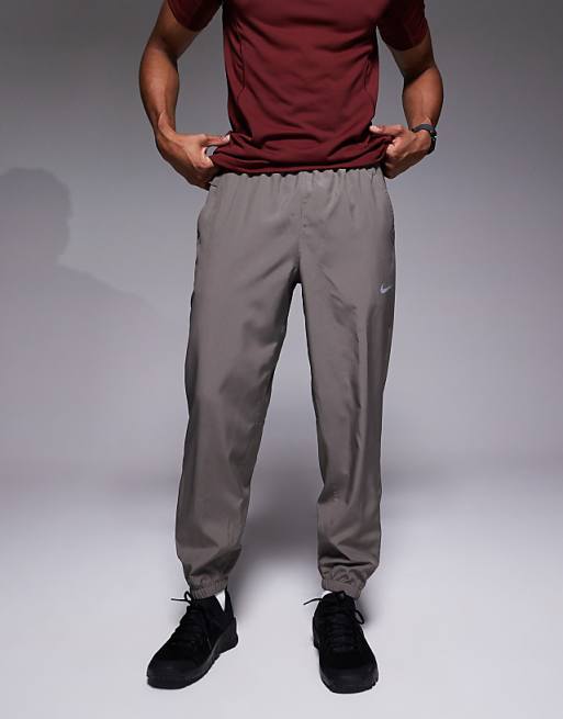 Nike Training Form Dri-FIT joggers in grey