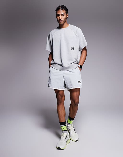 Nike Training Heritage Dri-FIT Fleece Short Sleeve Top In Grey