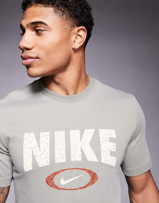 Nike Training Oval Swoosh Graphic T-shirt In Light Green