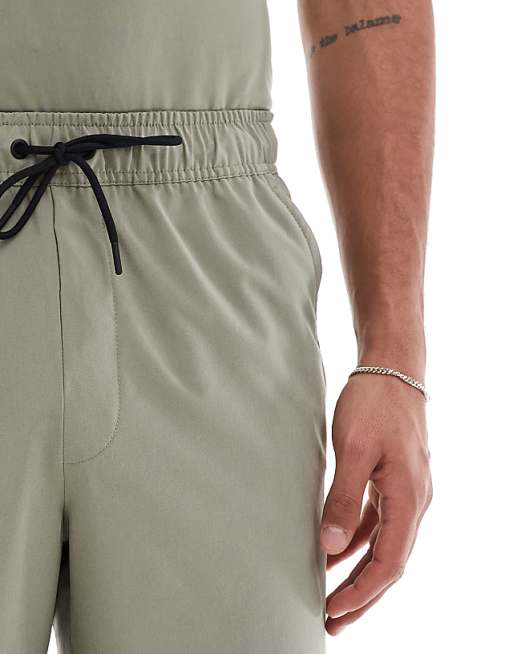 Nike Training Unlimited Dri-FIT Woven 9inch Shorts In Light Green