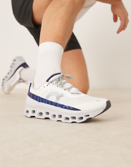 ON Cloudmonster running trainers in white and blue