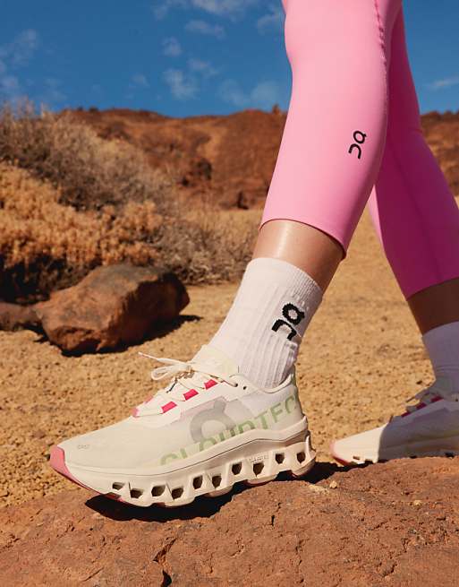 ON Cloudmonster running trainers in white and lime green