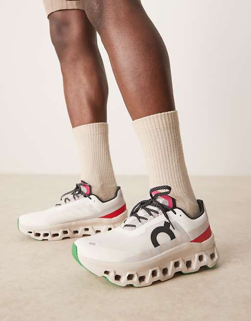 ON Cloudmonster running trainers in white and red