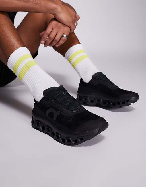 ON Cloudmonster Void running trainers in black