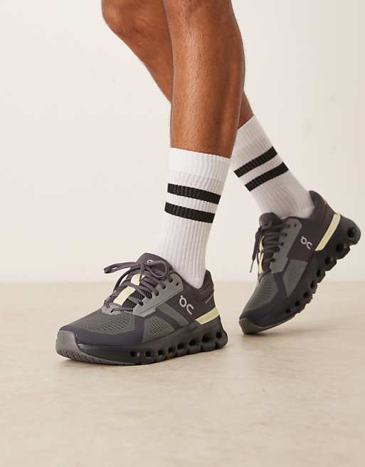 ON Cloudrunner 2 running trainers in rock and tangerine