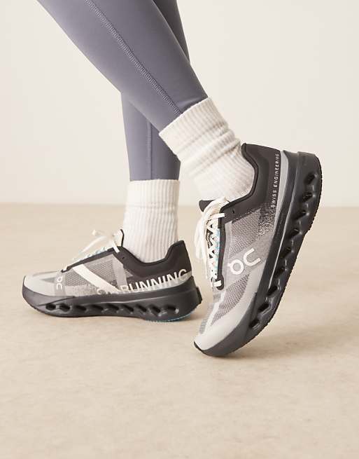ON Cloudsurfer Next running trainers in black