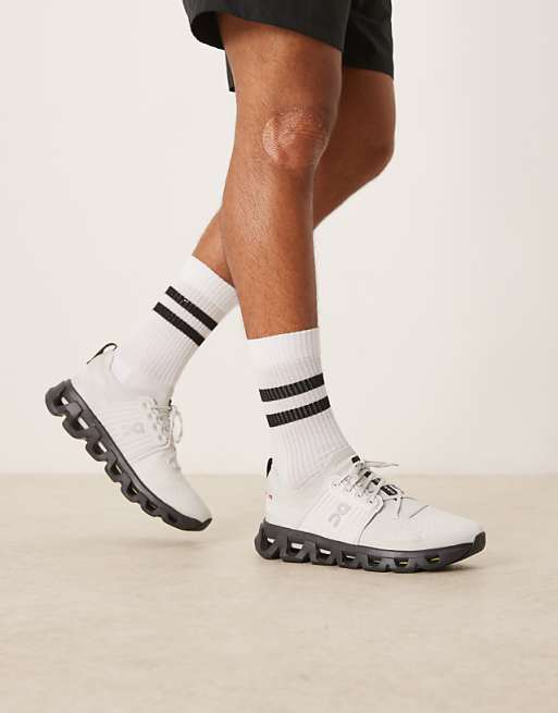 ON Cloudswift 4 running trainers in grey and black