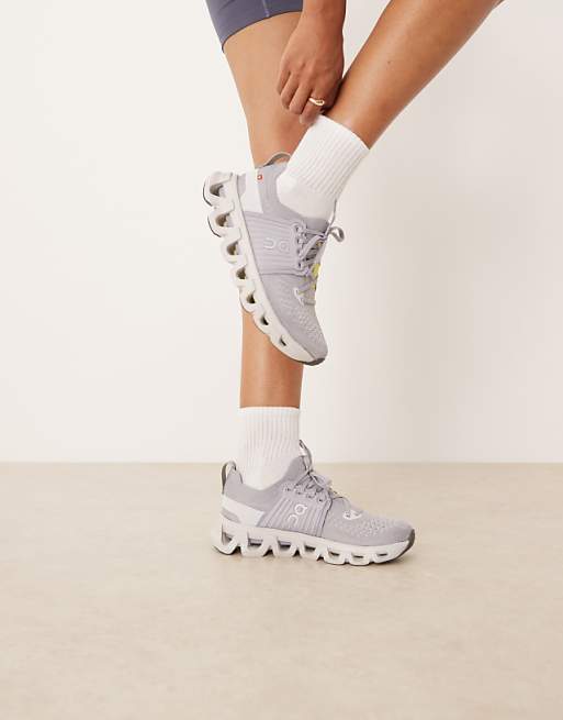 ON Cloudswift 4 running trainers in purple