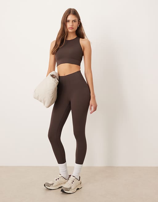 OYSHO Compressive core control ankle-length leggings in brown