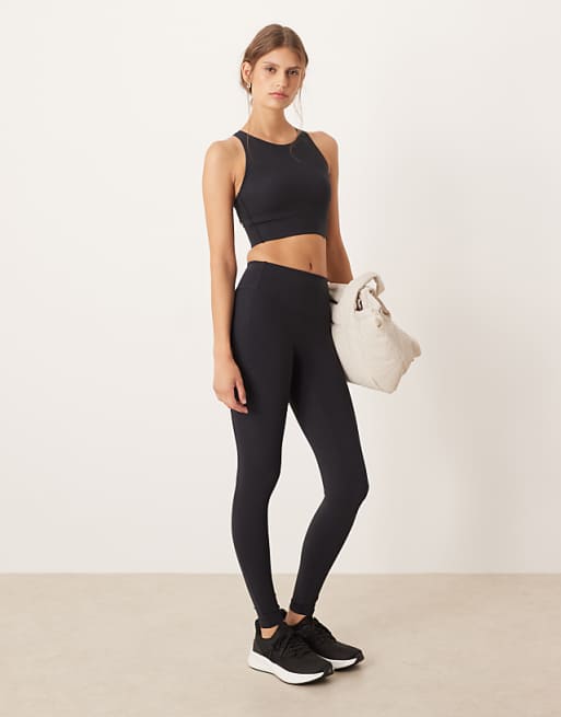 OYSHO Light touch high rise 20cm ankle-length leggings with pockets in black