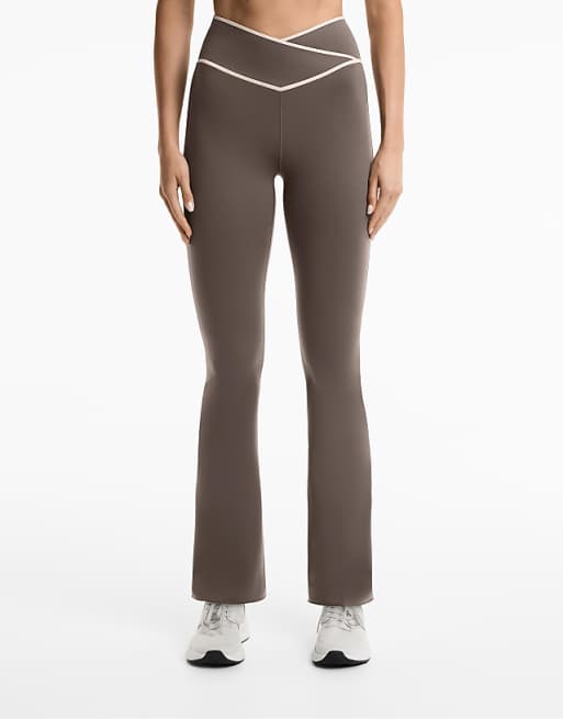 OYSHO Perfect-adapt crossover v-cut waist flare trousers in black