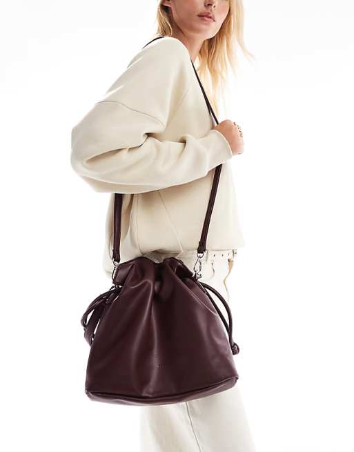 PASQ draw string soft shoulder bag in burgundy