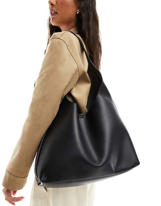 PASQ soft slouch shoulder bag with strap detail in black