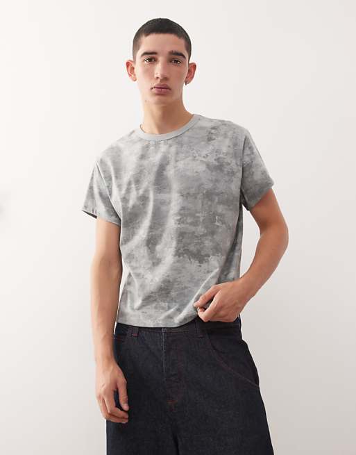 Reclaimed Vintage slim crop boxy t-shirt in camo print Reclaimed Vintage slim crop boxy t-shirt in camo print