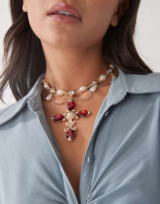 Reclaimed Vintage tangled halloween necklace with cross pendant and stones in gold