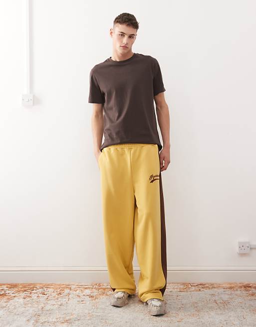 Reclaimed Vintage wide leg jogger in mustard with brown side stripe