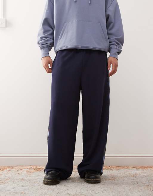 Reclaimed Vintage wide leg joggers with check side panel in navy