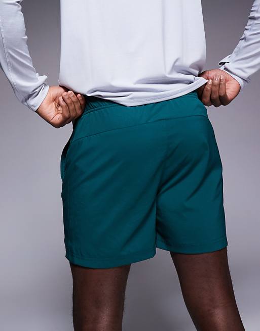 The North Face 24/7 5"" Logo Shorts In Dark Green