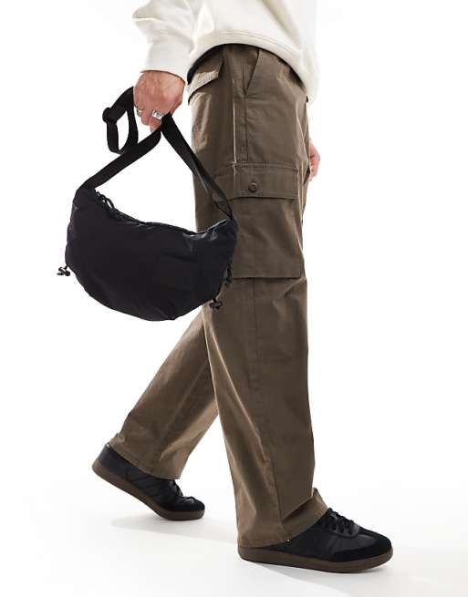 The North Face Never Stop Sling Cross Body Bag In Black